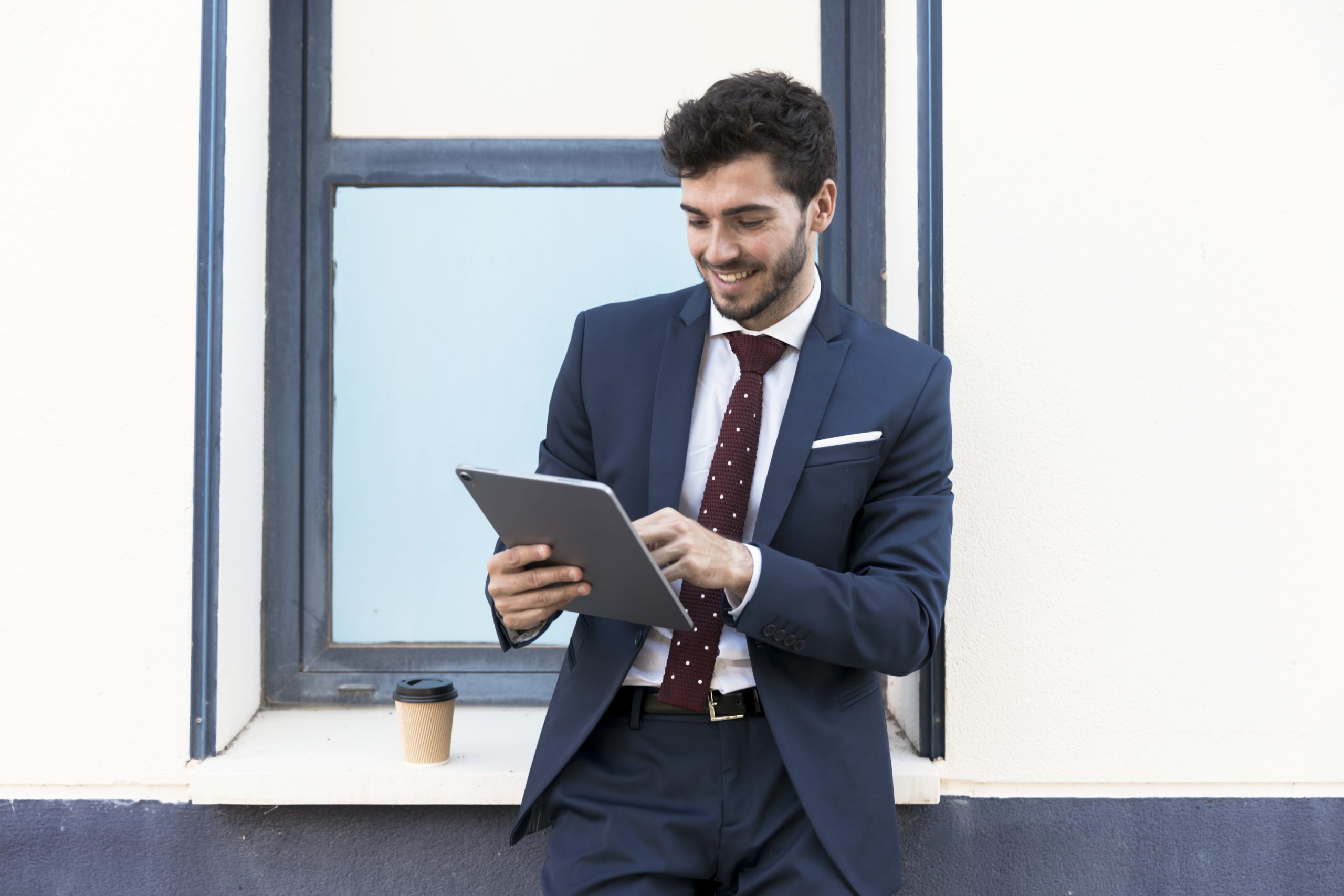 front view lawyer looking his tablet